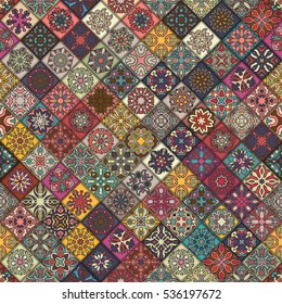 Colorful vintage seamless pattern with floral and mandala elements.Hand drawn background. Can be used for fabric, wallpaper, tile, wrapping, covers and carpet. Islam, Arabic, Indian, ottoman motifs.
