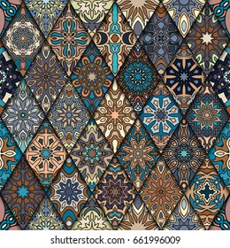 Colorful vintage seamless pattern with floral and mandala elements.Hand drawn background. Can be used for fabric, wallpaper, tile, wrapping, covers and carpet. Islam, Arabic, Indian, ottoman motifs.