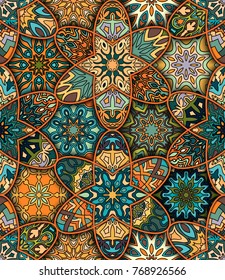 Colorful vintage seamless pattern with floral and mandala elements.Hand drawn background. Can be used for fabric, wallpaper, tile, wrapping, covers and carpet. Islam, Arabic, Indian, ottoman motifs.