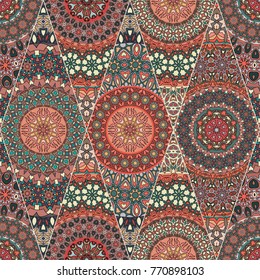Colorful vintage seamless pattern with floral and mandala elements.Hand drawn background. Can be used for fabric, wallpaper, tile, wrapping, covers and carpet. Islam, Arabic, Indian, ottoman motifs.