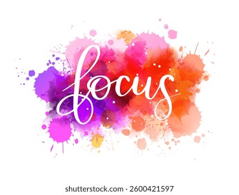 Colorful watercolor splash with the word 'focus' in elegant hadwritten modern script.