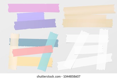 Colorful and white adhesive, sticky, masking, duct tape, paper strips, pieces for text on gray background