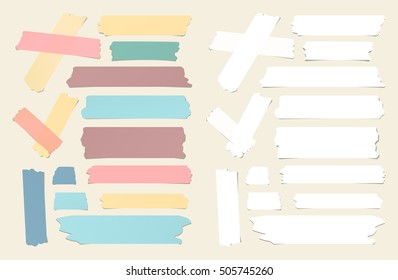 Colorful and white different size sticky, adhesive masking tape are on beige background