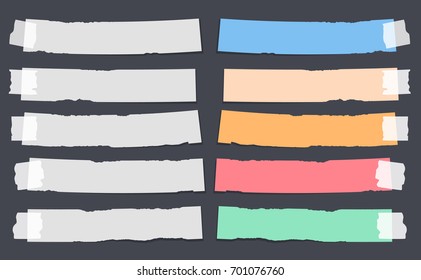 Colorful and white ripped, note, copybook, notebook paper strips stuck with sticky, adhesive tape on black background.