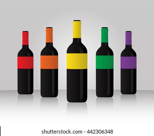 Colorful wine bottle standing at grey background
