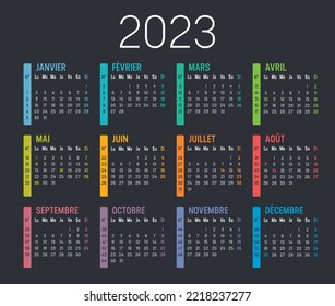 Colorful year 2023 calendar, with weeks numbers, in French language, isolated on a dark background. Vector template.