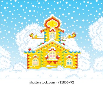 colorfully decorated small wood house covered with snow on Christmas