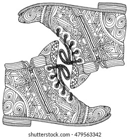 Coloring book page for adult anti stress. Hippie sneakers in zentangle style. Indian ornament. Fashion shoes. Boho.