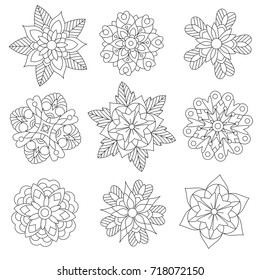 Coloring page of christmas floral decorations. Collection of snowflakes. Freehand sketch drawing for adult antistress coloring book with zentangle elements.