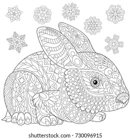 Coloring page of rabbit (bunny) and winter snowflakes. Freehand sketch drawing for adult antistress coloring book in zentangle style with doodle elements.