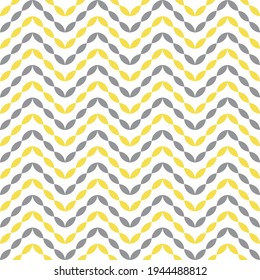 Colors of year 2021 illuminating yellow and ultimate gray simple chevron pattern. Abstract geometric zigzag stripes seamless pattern. Geometric design for web and print on textile, fabric, paper