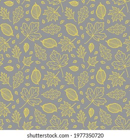 Colors of year 2021 illuminating yellow and ultimate gray doodle leaves vector pattern. Cute seamless print for textile, paper. Nature ornament with hand drawn doodle leaves and acorns