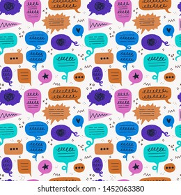 Colouful speech bubble seamless pattern with online thinking and typing symbols. Wallpaper with flat balloons of chat, conversation, dialogue. Repeating comic talking clouds with doodles and scribbles