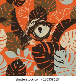 Coloured African seamless pattern with leopard eye on red background