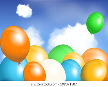 coloured balloons floating in a blue sky with fluffy clouds
