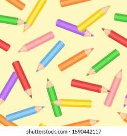 Coloured pencil pattern on yellow background. Colourful pencil seamless pattern. Great for wallpaper, web background, wrapping paper, fabric, packaging, greeting cards and more.