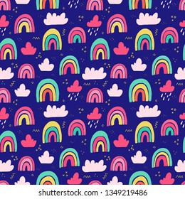Coloured rainbows seamless pattern on navy blue background. Cartoon style wallpaper with arches, clouds, rain drops and doodles. Flat style vector illustration for textile, backdrop, wrapping paper