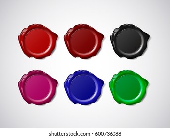 Coloured wax seal, signet or stamp isolated on white