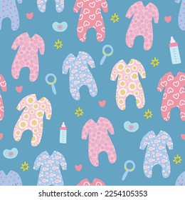 Colourful baby rompers on blue background. Seamless pattern. For textile, packaging, DIY projects.