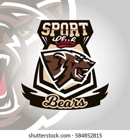 Colourful emblem, logo, snarling and ready to attack bear, grizzly, dangerous predator, the dweller forest. Vector illustration, dynamic and sporty style, printing on T-shirts 