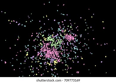 Colourful explosion of confetti. Grainy glitter and sprinkles. Abstract holiday illustration. Isolated on black background. Abstract textured isolated on white background. Vector.