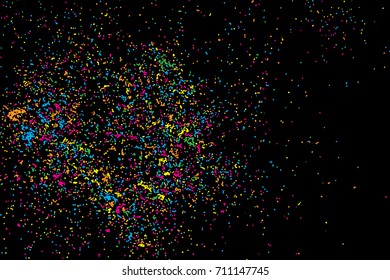 Colourful explosion of confetti. Grainy glitter and sprinkles. Abstract holiday illustration. Isolated on black background. Abstract textured isolated on white background. Vector