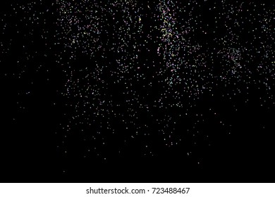 Colorida explosión de confetti. Luminosidad y espolvorines. Imagen abstracta de festividad.  Aislado sobre fondo negro. Texto abstracto aislado sobre fondo blanco. Vector.