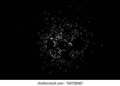 Colourful explosion of confetti. Grainy glitter and sprinkles. Abstract holiday illustration. Isolated on black background. Abstract textured isolated on white background. Vector.