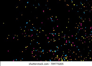 Colourful explosion of confetti. Grainy textured birthday design for greeting cards and posters, glitter design template for birthday and holidays visuals. Vector.