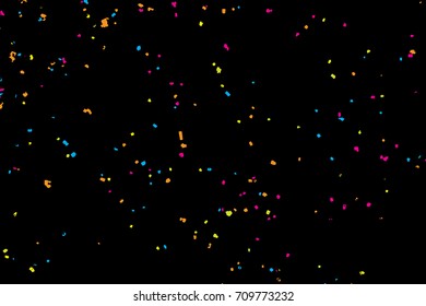 Colourful explosion of confetti. Grainy textured birthday design for greeting cards and posters, glitter design template for birthday and holidays visuals. Vector.