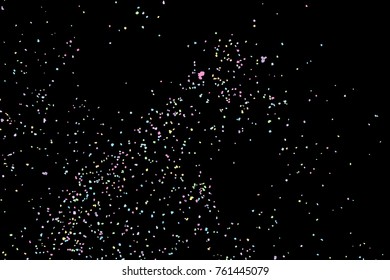 Colourful explosion of confetti. Grainy textured birthday design for greeting cards and posters, glitter design template for birthday and holidays visuals. Vector.