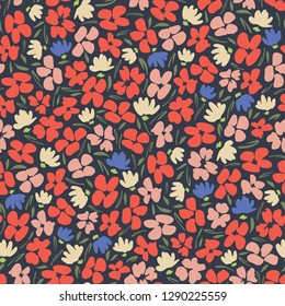 Colourful graphic ditsy gestural blooms and foliage on dark background vector seamless pattern. Floral Texture