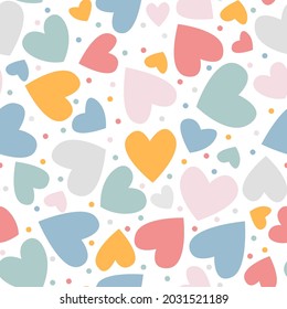 Colourful hearts are seamless. Childish print for apparel, poster, nursery decoration. Vector rainbow print.