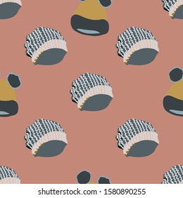 Colourful knitted hats seamless pattern on dusty pink background. Web, wrapping paper, textile, wallpaper design, background fill.