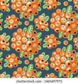 Colourful seamless pattern of firethorn pyracantha decorative garden hedge with yellow berries and green leaves on dark teal background