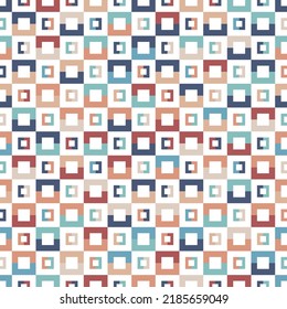 Colourful seamless vector pattern with simple geometric tiles in blue, red and orange. Modern playful background for fashion, interior design and wallpaper.