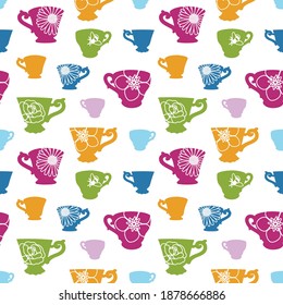 Colourful seamless vector pattern with vintage teacups and flower motifs, ideal for fabric, scrapbooking, gift wrap, wallpaper projects.