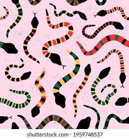 Colourful snakes on pink background seamless pattern. Vector hand drawn grunge style illustration icon. Different color snakes seamless pattern