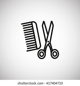 Comb and scissors icon