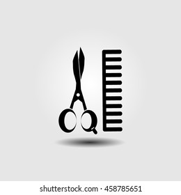 Comb and scissors icon.