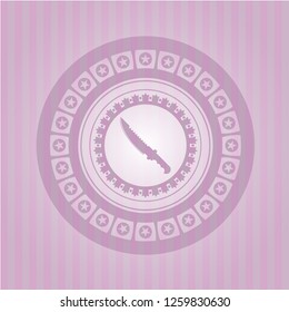 combat knife icon inside badge with pink background