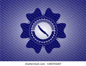 combat knife icon inside badge with jean texture