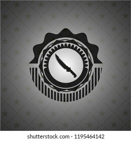 combat knife icon inside black badge