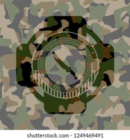 combat knife icon inside camo emblem