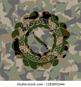 combat knife icon inside camouflage texture