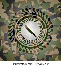 combat knife icon inside camouflaged emblem