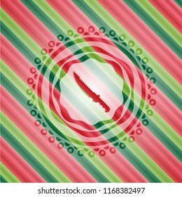 combat knife icon inside christmas colors emblem.