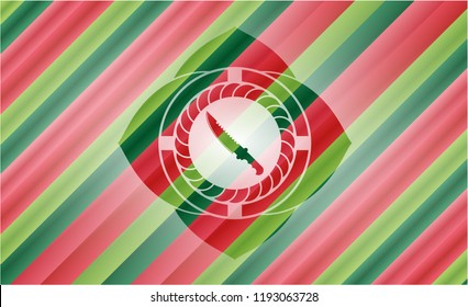combat knife icon inside christmas colors emblem.