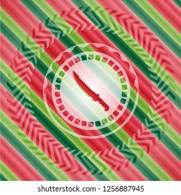 combat knife icon inside christmas colors style emblem.