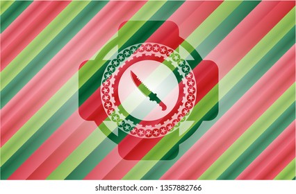 combat knife icon inside christmas colors style badge.